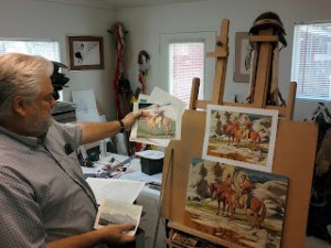 Artist Paul Mann hard at work in his studio. 