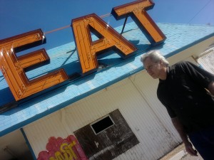 Wayne In font of a cool old vacant diner in or near Vegas