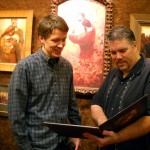 Kirk and Will looking at Kirk's new book.